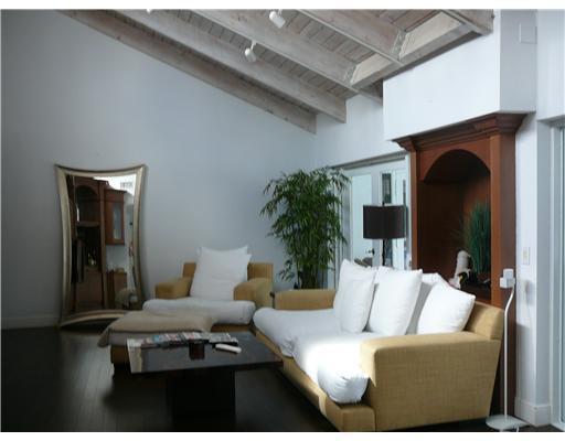 7149 Encina Lane Boca Raton, FL 33433 - Photo 6 of 22 a living room with furniture and a fireplace
