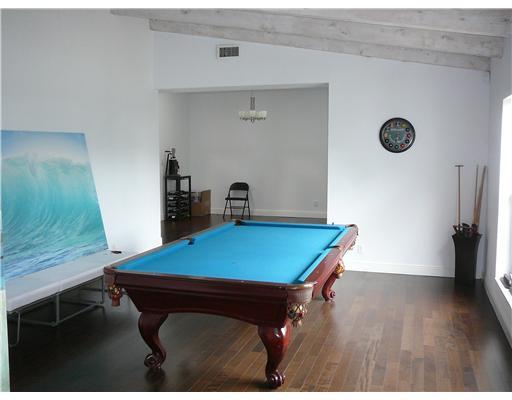 7149 Encina Lane Boca Raton, FL 33433 - Photo 10 of 22 a room with pool table and a wooden floor