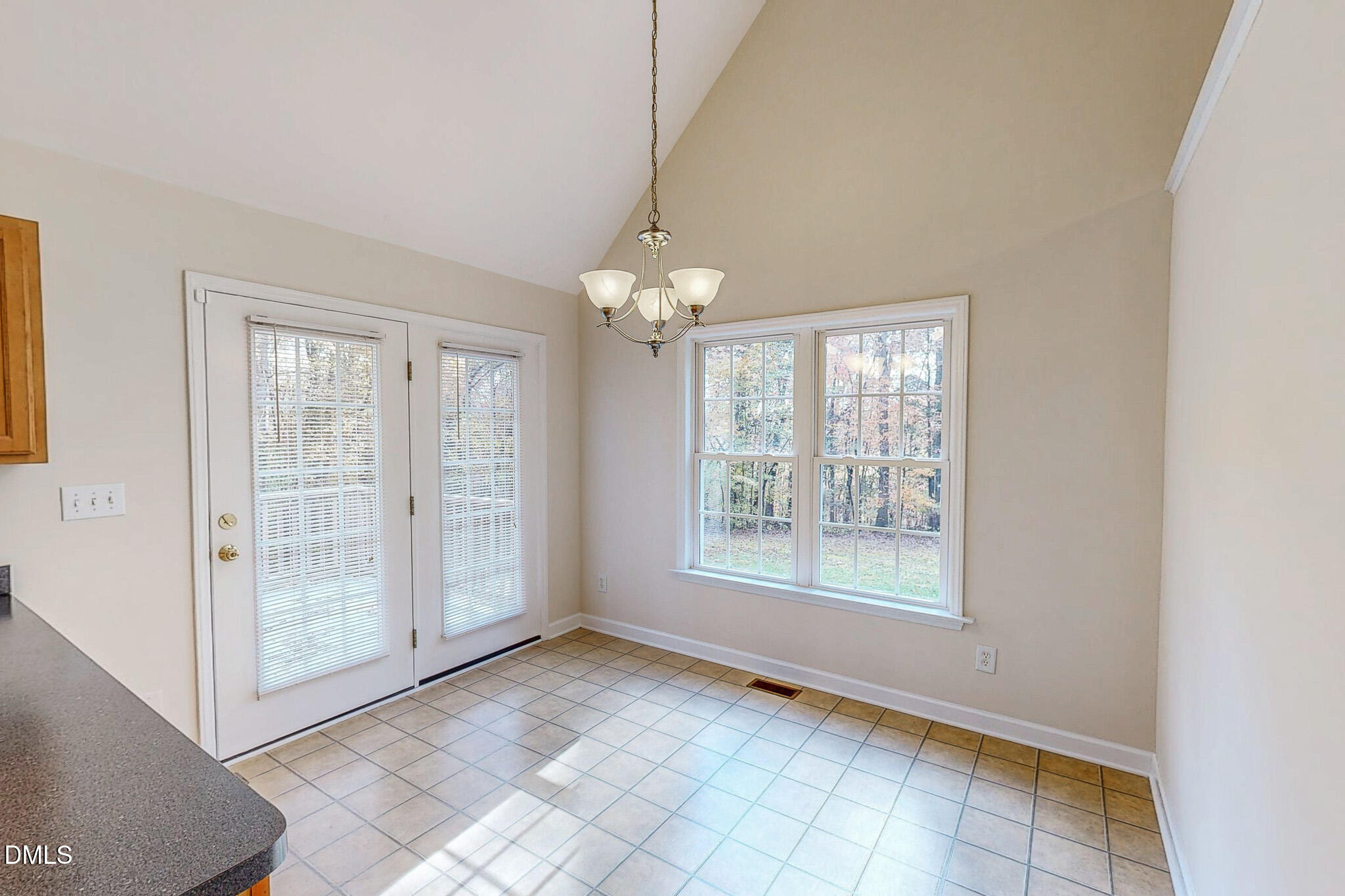 689 Lockamy Road Timberlake, NC 27583 - Photo 13 of 33 a view of an empty room with a window