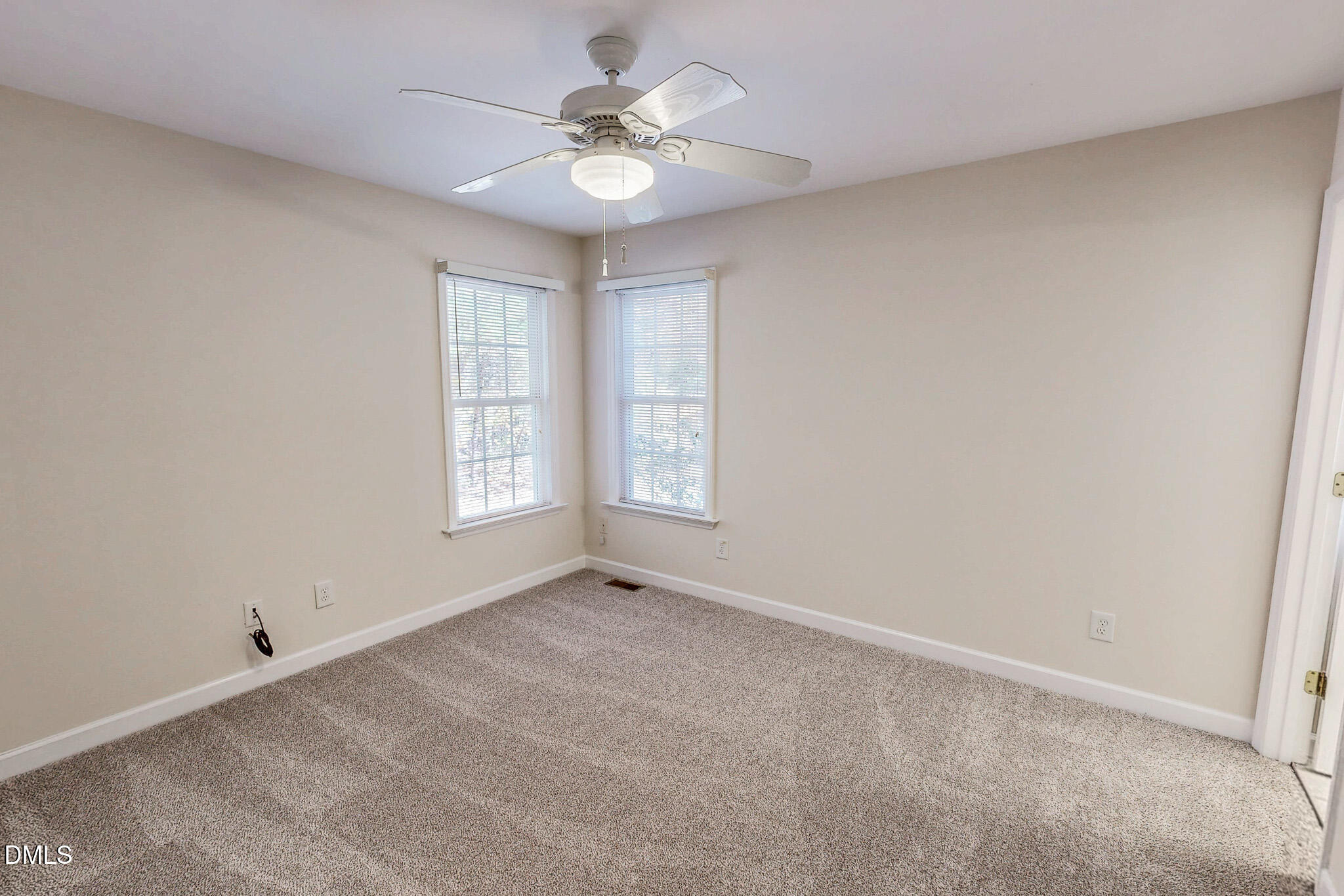689 Lockamy Road Timberlake, NC 27583 - Photo 17 of 33 a view of an empty room with a window