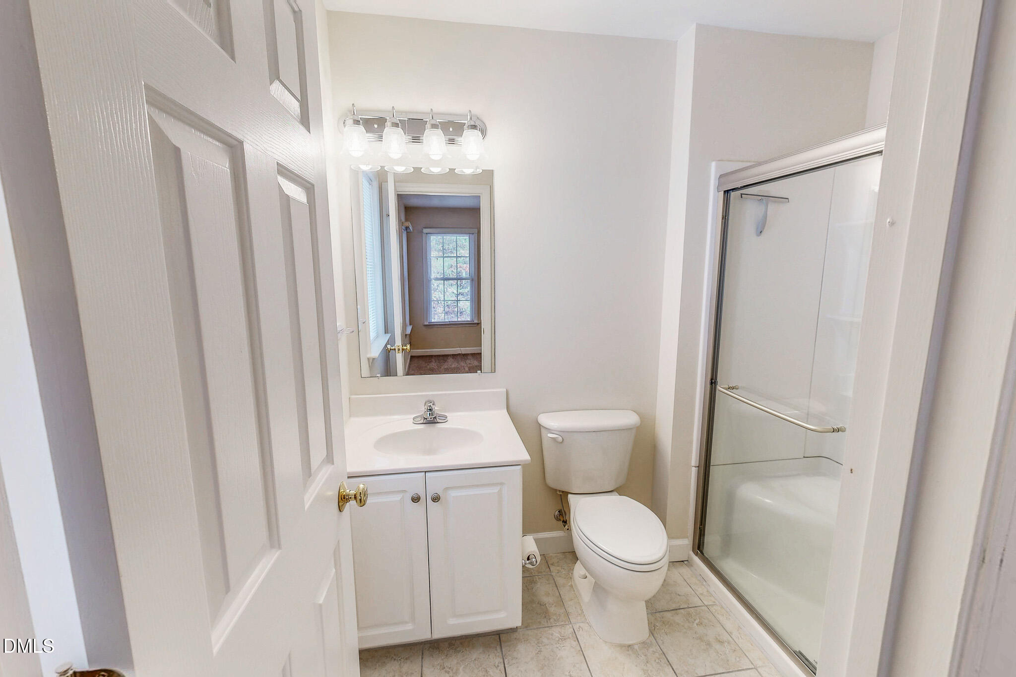 689 Lockamy Road Timberlake, NC 27583 - Photo 19 of 33 a white toilet sitting next to a bathroom sink