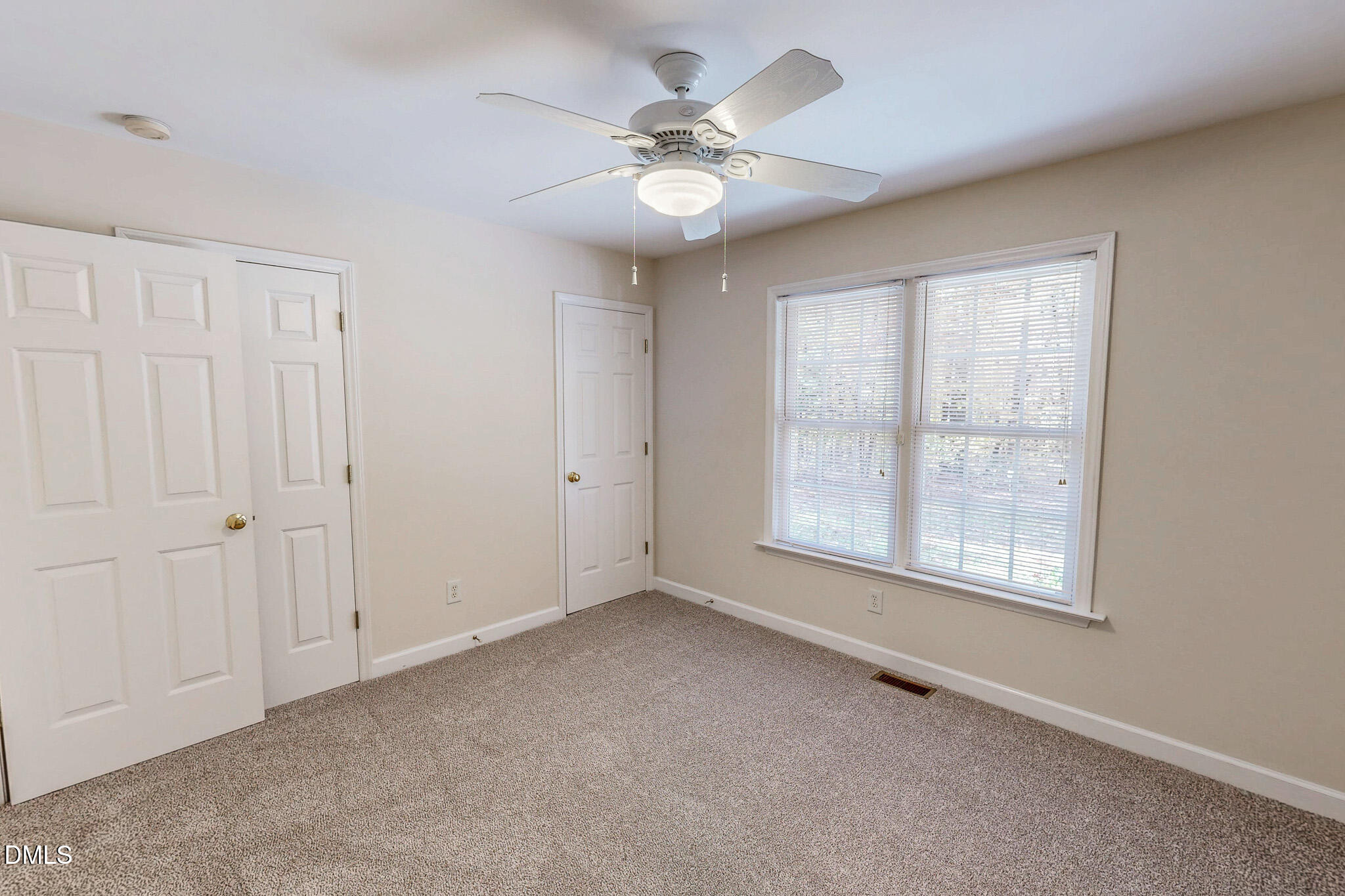 689 Lockamy Road Timberlake, NC 27583 - Photo 21 of 33 a view of an empty room with a window