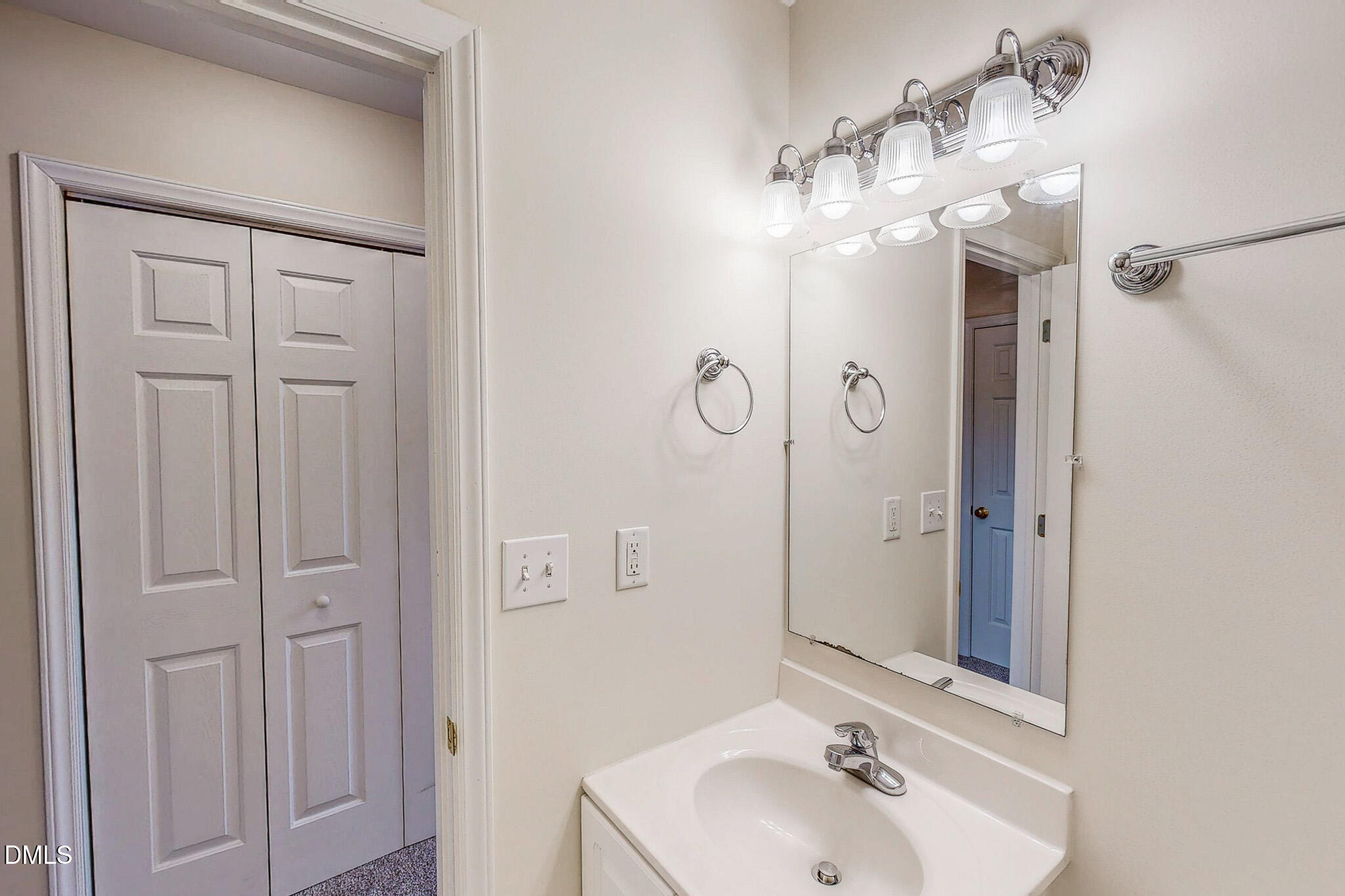 689 Lockamy Road Timberlake, NC 27583 - Photo 23 of 33 a bathroom with a sink and mirror