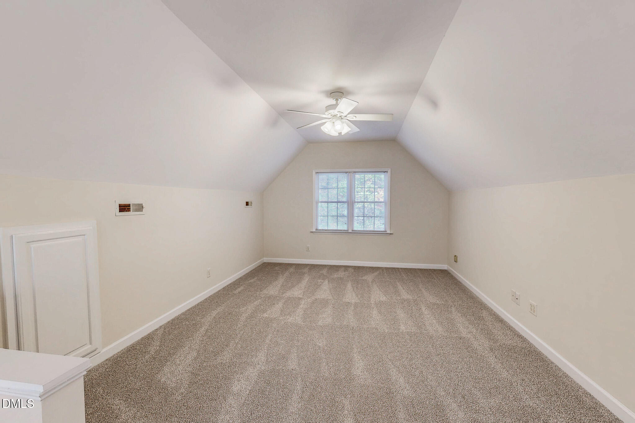 689 Lockamy Road Timberlake, NC 27583 - Photo 26 of 33 wooden floor in an empty room with a window