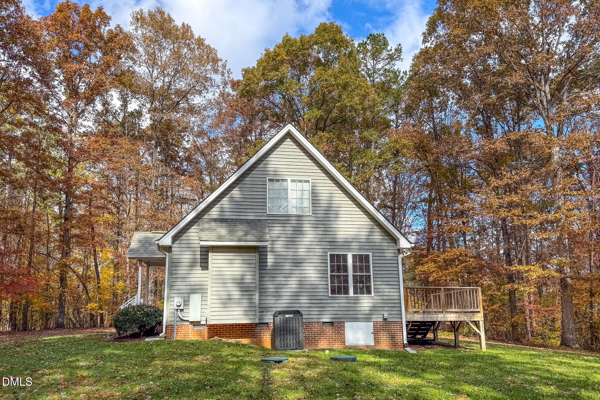 689 Lockamy Road Timberlake, NC 27583 - Photo 33 of 33 a view of a house with a yard
