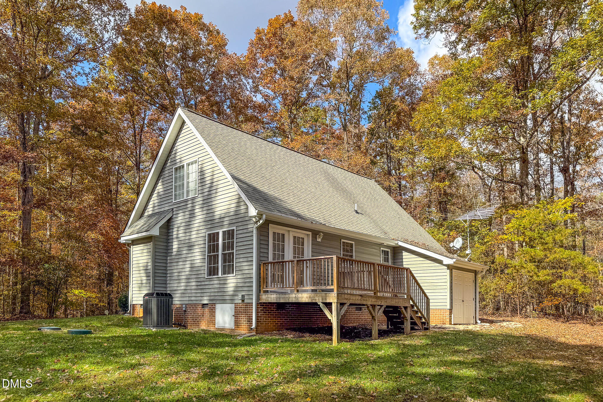689 Lockamy Road Timberlake, NC 27583 - Photo 5 of 33 a view of a house with a yard