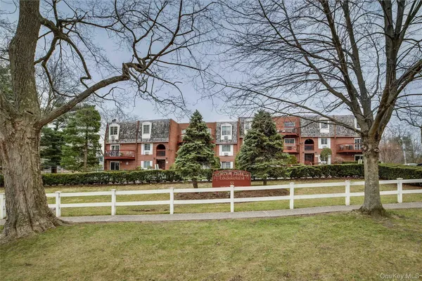 a view of a playground with basketball court