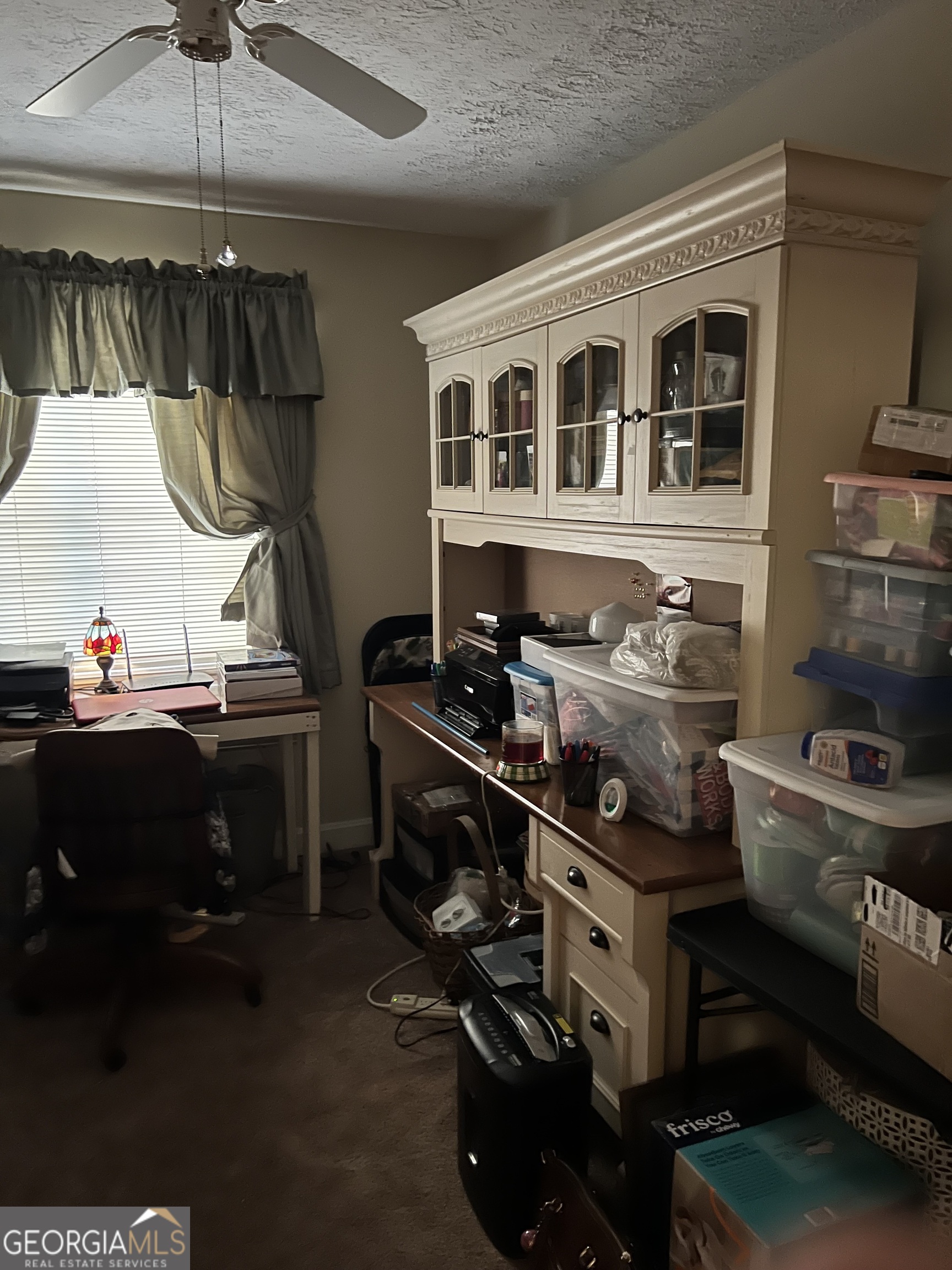 6419 Cochran Highway Cochran, GA 31014 - Photo 19 of 55 a room with furniture and a fireplace