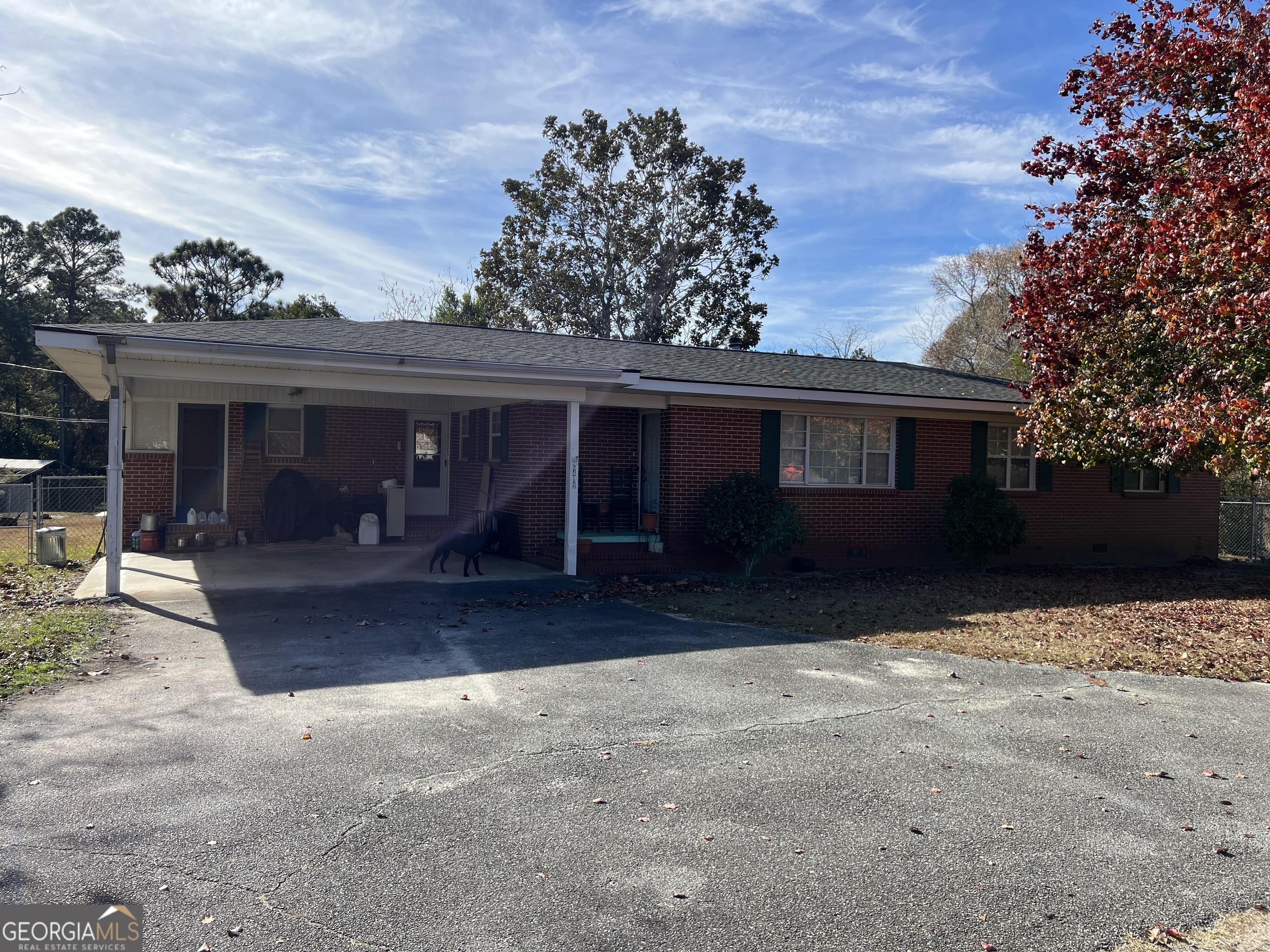 6419 Cochran Highway Cochran, GA 31014 - Photo 2 of 55 a view of a house with a yard
