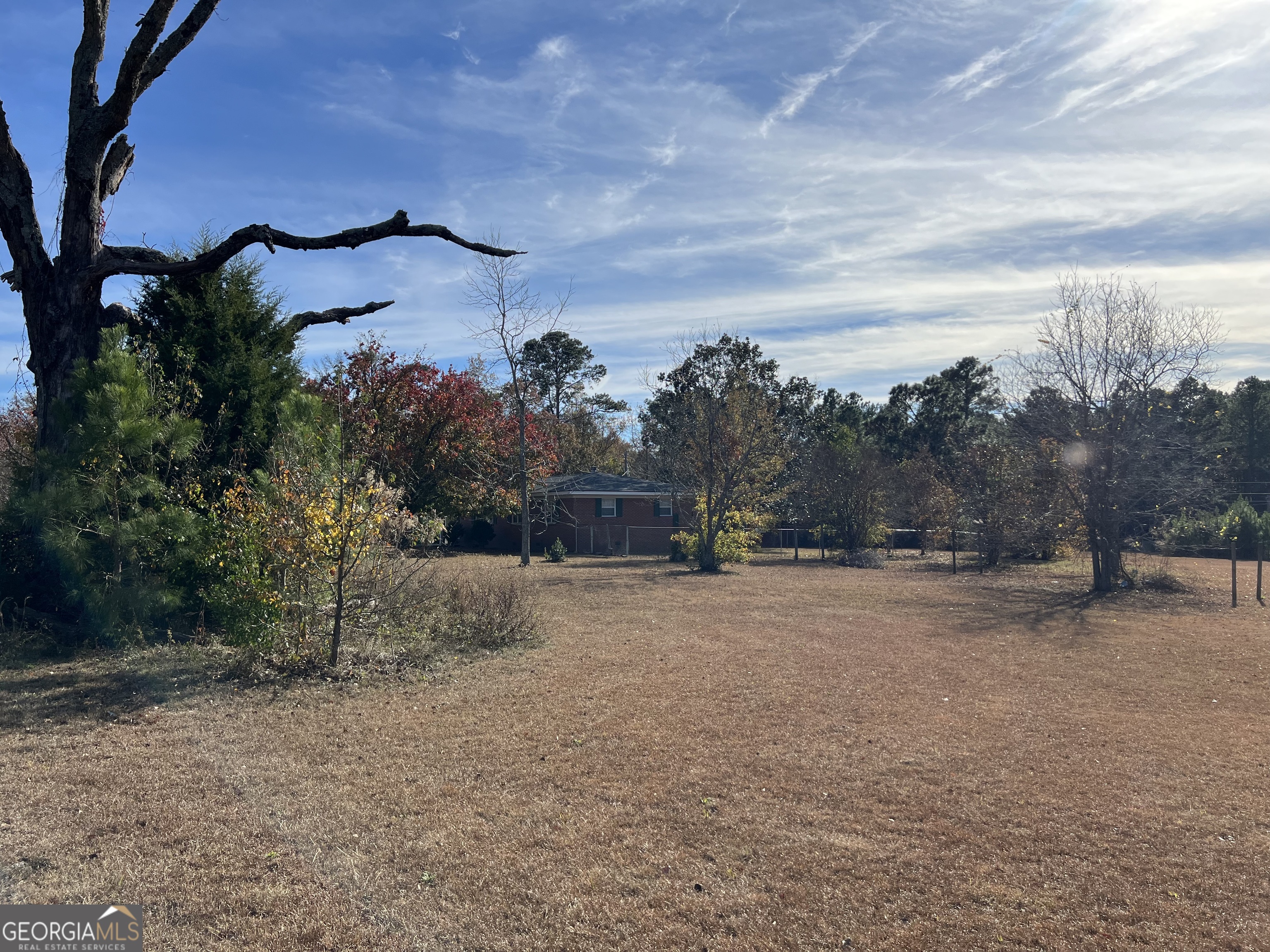 6419 Cochran Highway Cochran, GA 31014 - Photo 34 of 55 a view of a house with a yard