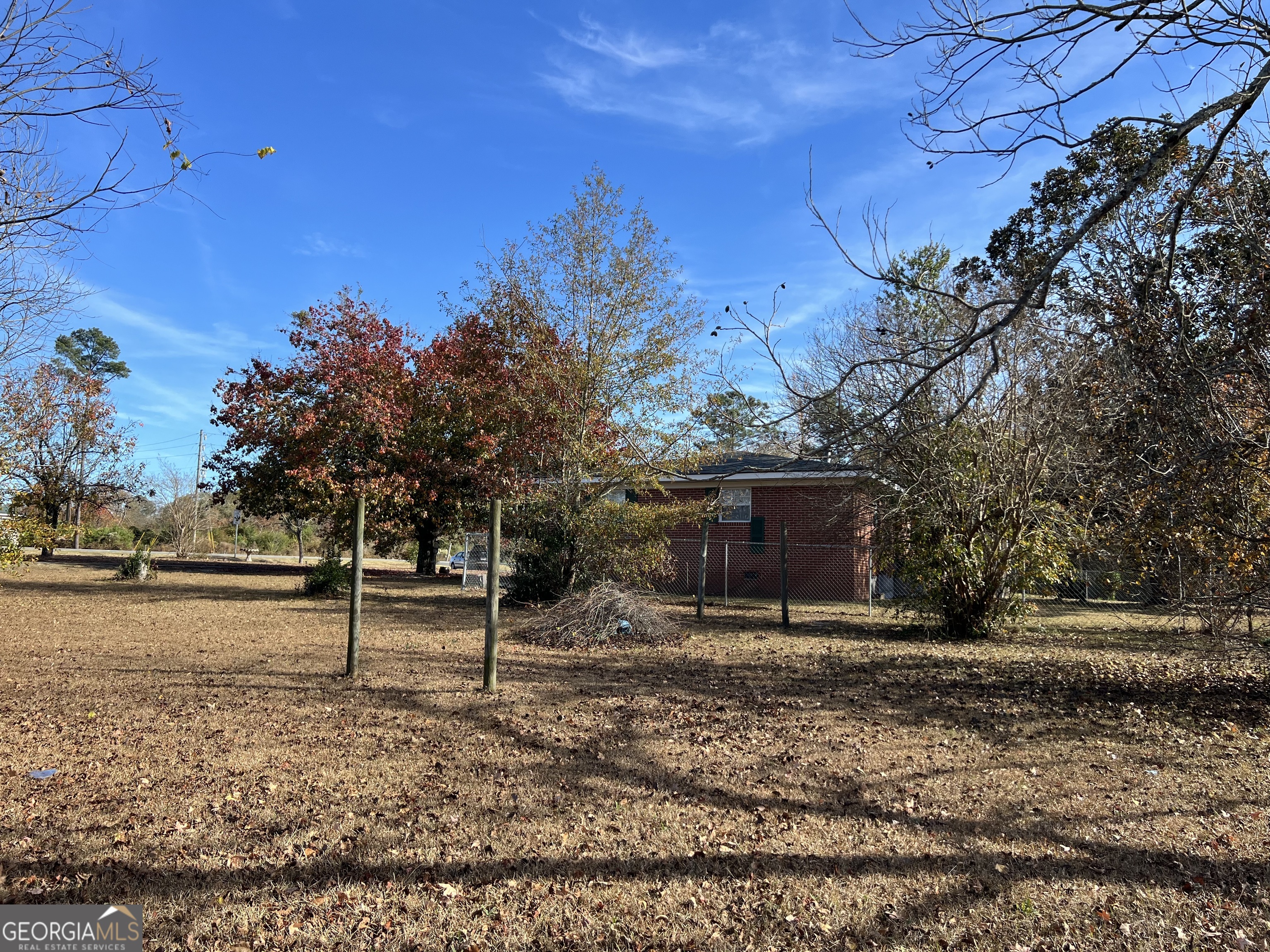 6419 Cochran Highway Cochran, GA 31014 - Photo 36 of 55 a view of backyard with wooden fence