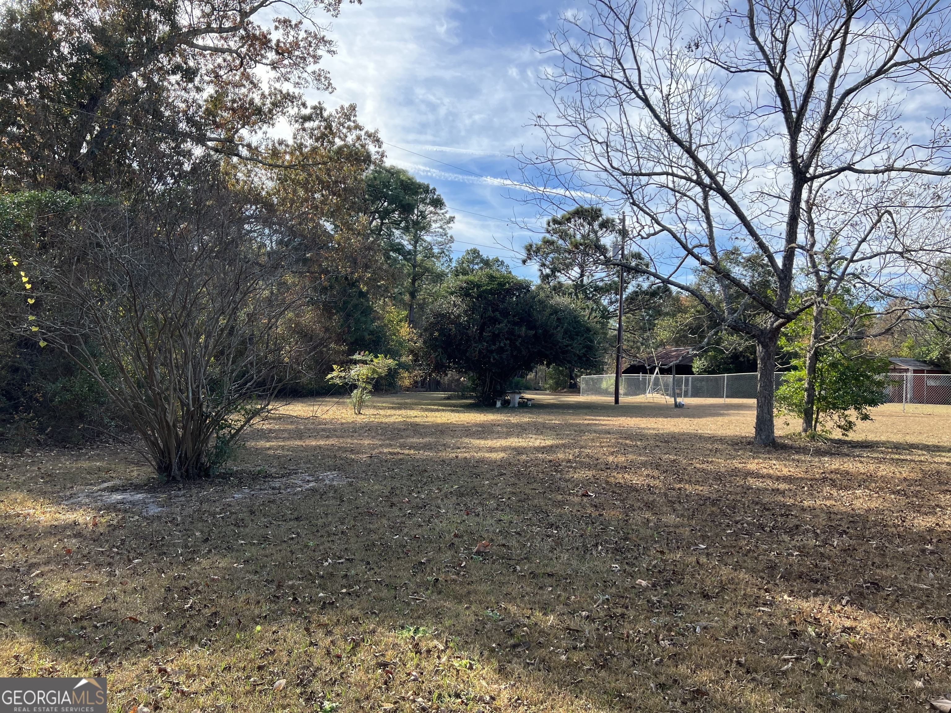 6419 Cochran Highway Cochran, GA 31014 - Photo 52 of 55 a view of road with trees