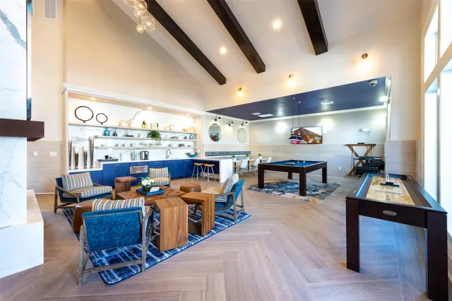 a room with lots of furniture and clutter