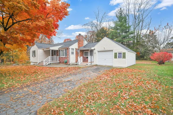 a front view of a house with yard