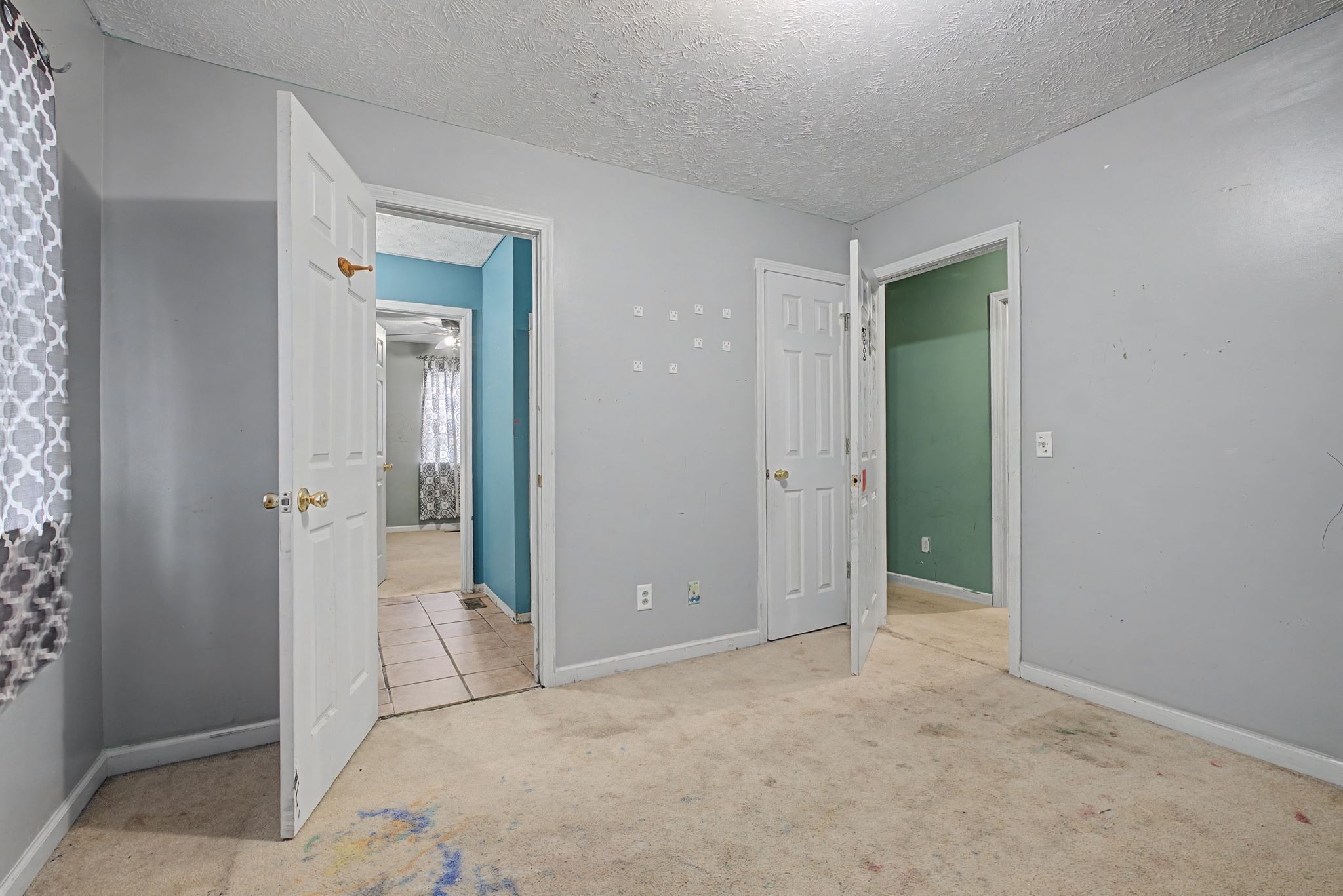 178 Spring Street Carthage, TN 37030 - Photo 15 of 27 an empty room with closet and a bathroom