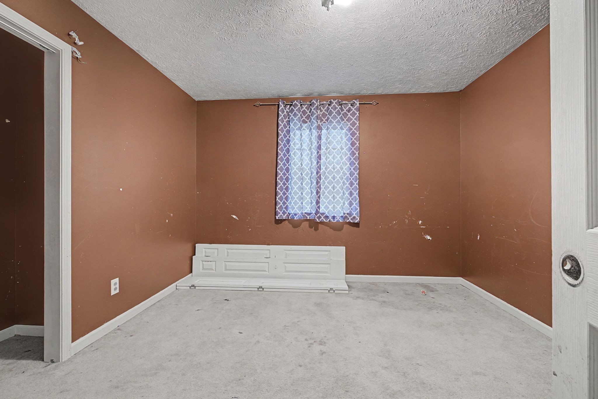 178 Spring Street Carthage, TN 37030 - Photo 21 of 27 en empty room with windows