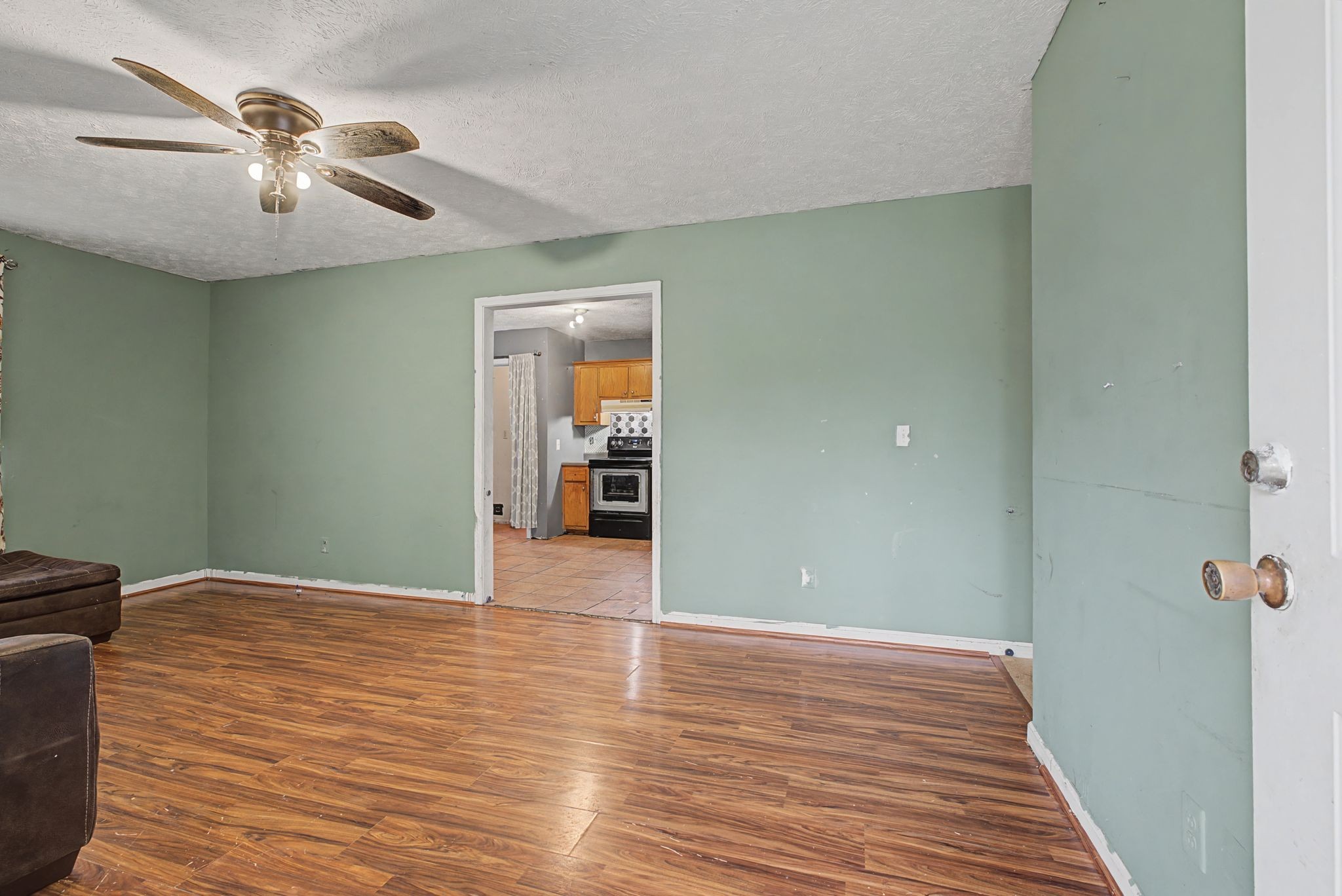 178 Spring Street Carthage, TN 37030 - Photo 5 of 27 a view of an empty room with wooden floor