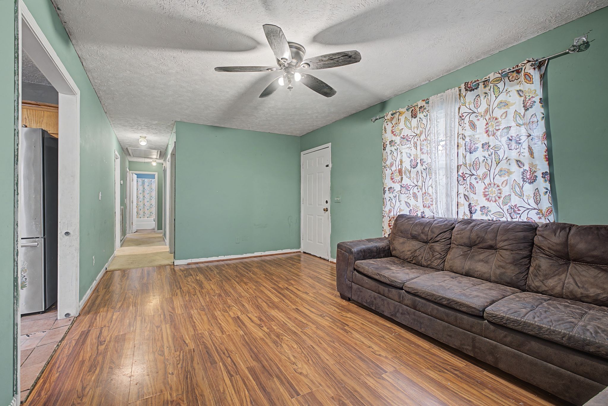 178 Spring Street Carthage, TN 37030 - Photo 7 of 27 a living room with furniture and a large window
