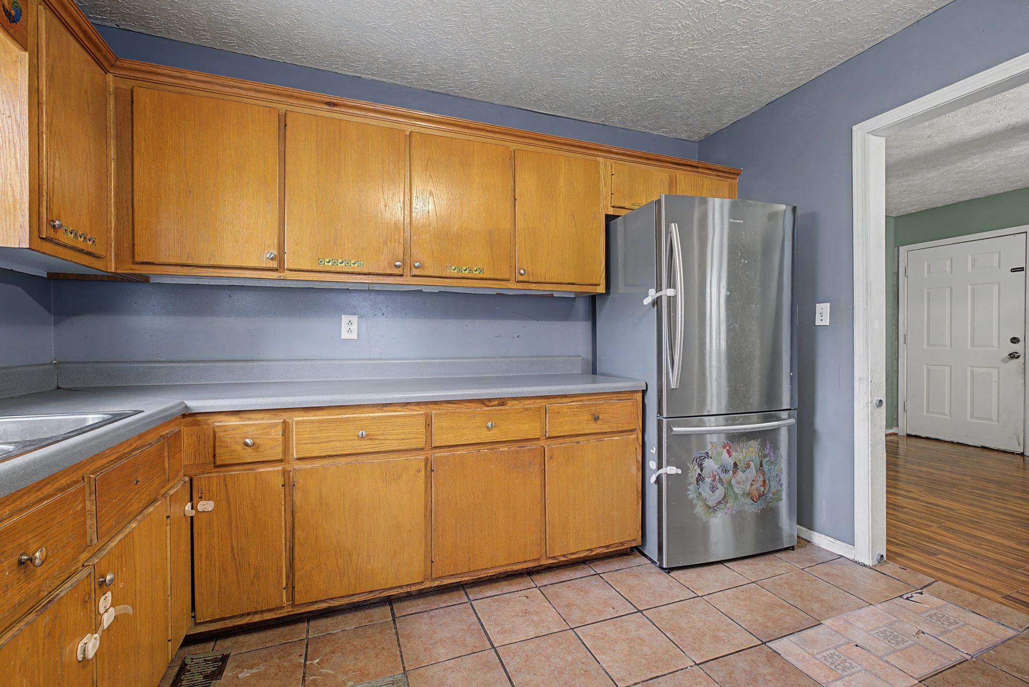 178 Spring Street Carthage, TN 37030 - Photo 9 of 27 a kitchen with stainless steel appliances granite countertop a refrigerator sink and cabinets