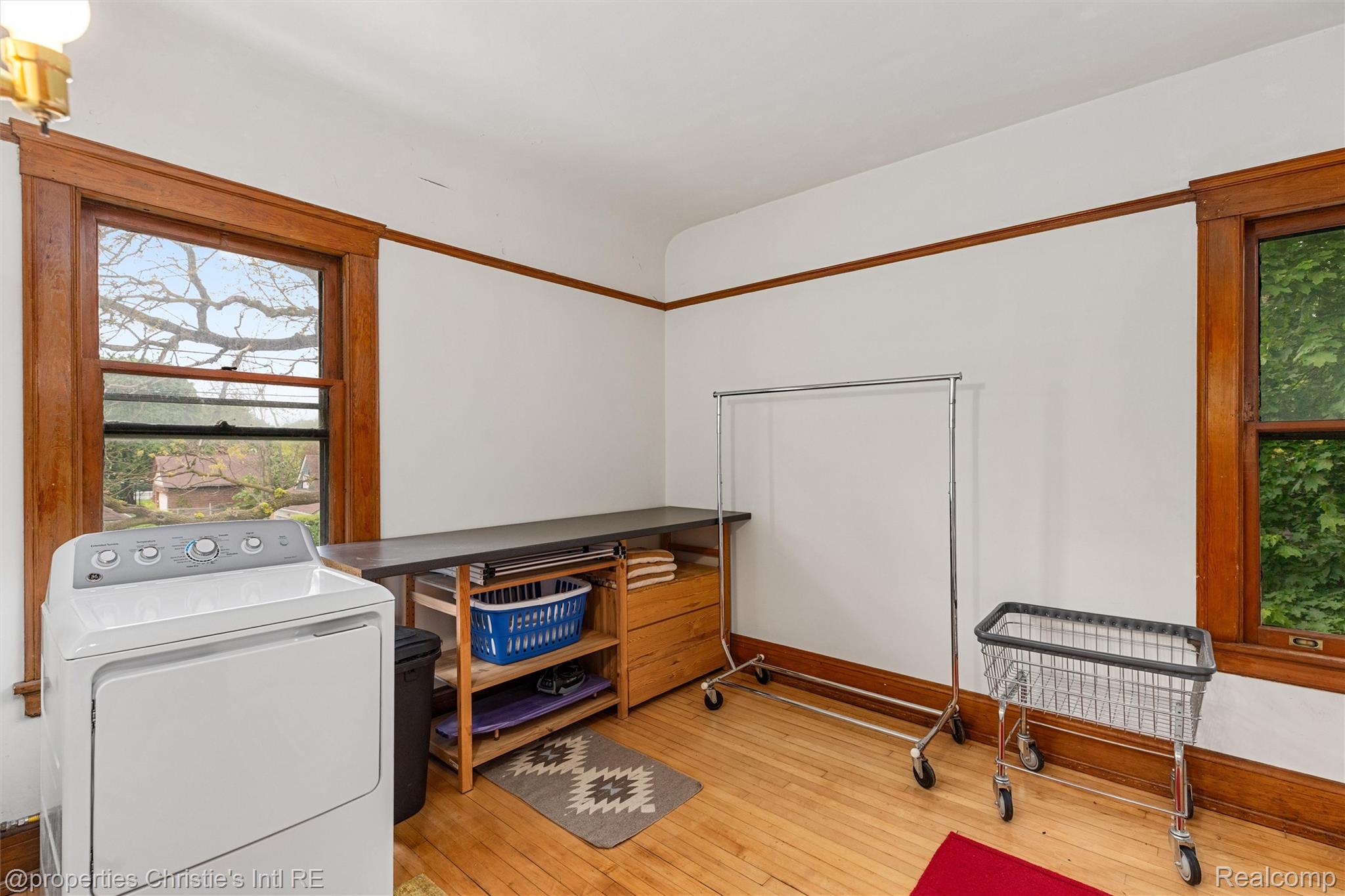 36 Longfellow Street Detroit, MI 48202 - Photo 52 of 81 Laundry area featuring washer / dryer and light wood-style floors