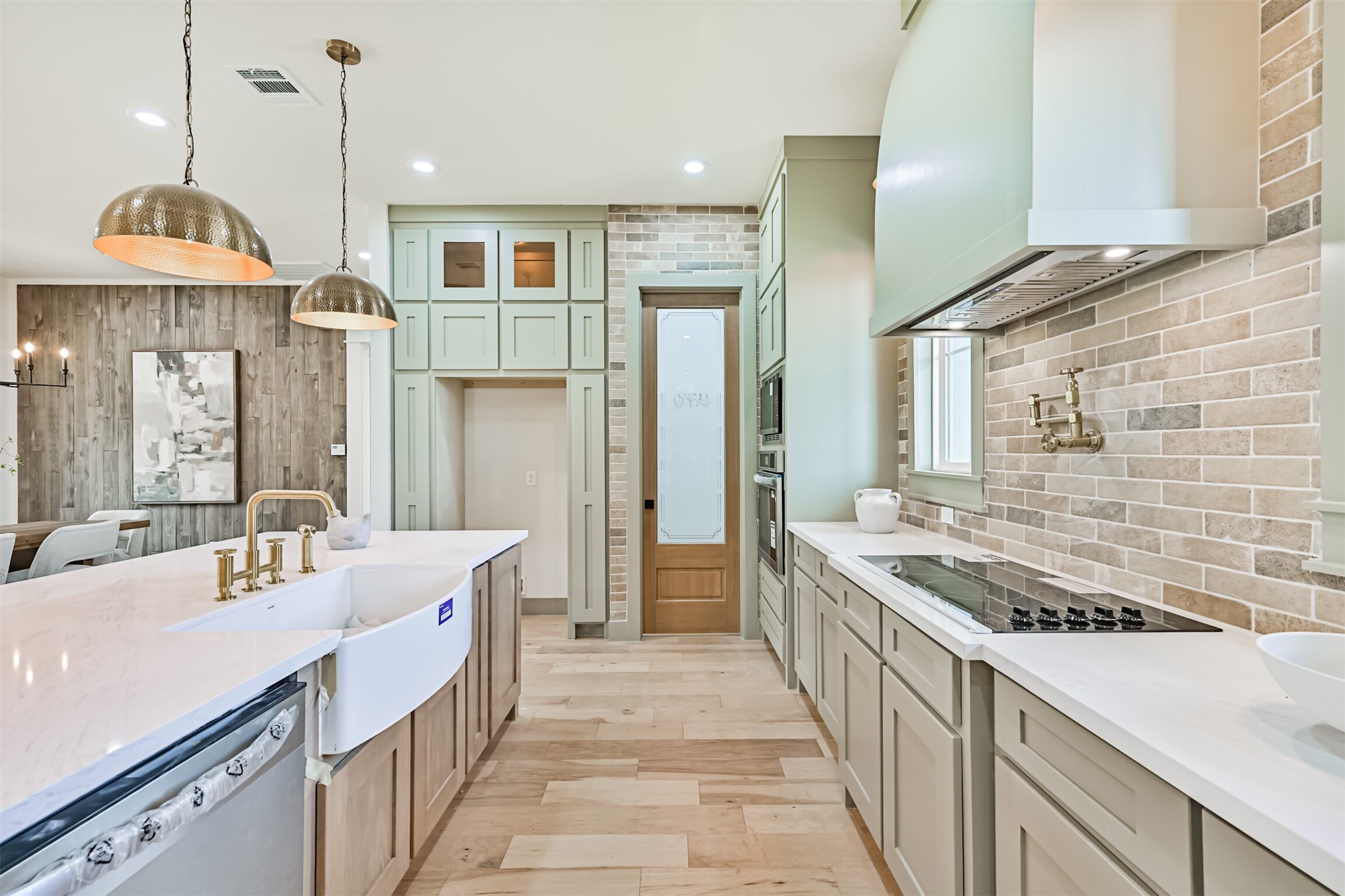 208 Pony Trail Angleton, TX 77515 - Photo 17 of 50 a spacious kitchen with stainless steel appliances granite countertop a sink stove and refrigerator