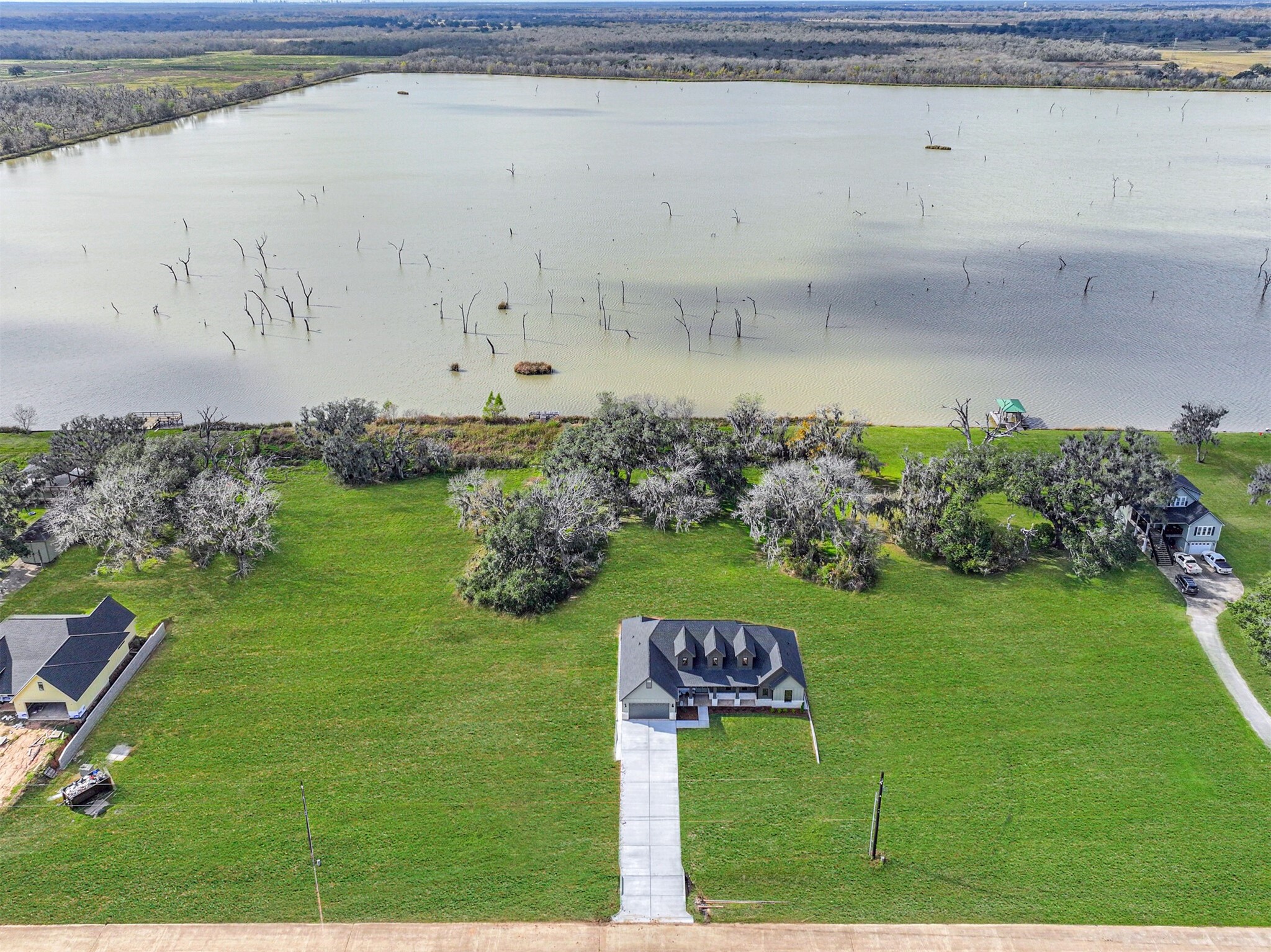 208 Pony Trail Angleton, TX 77515 - Photo 2 of 50 a view of a back yard of the house