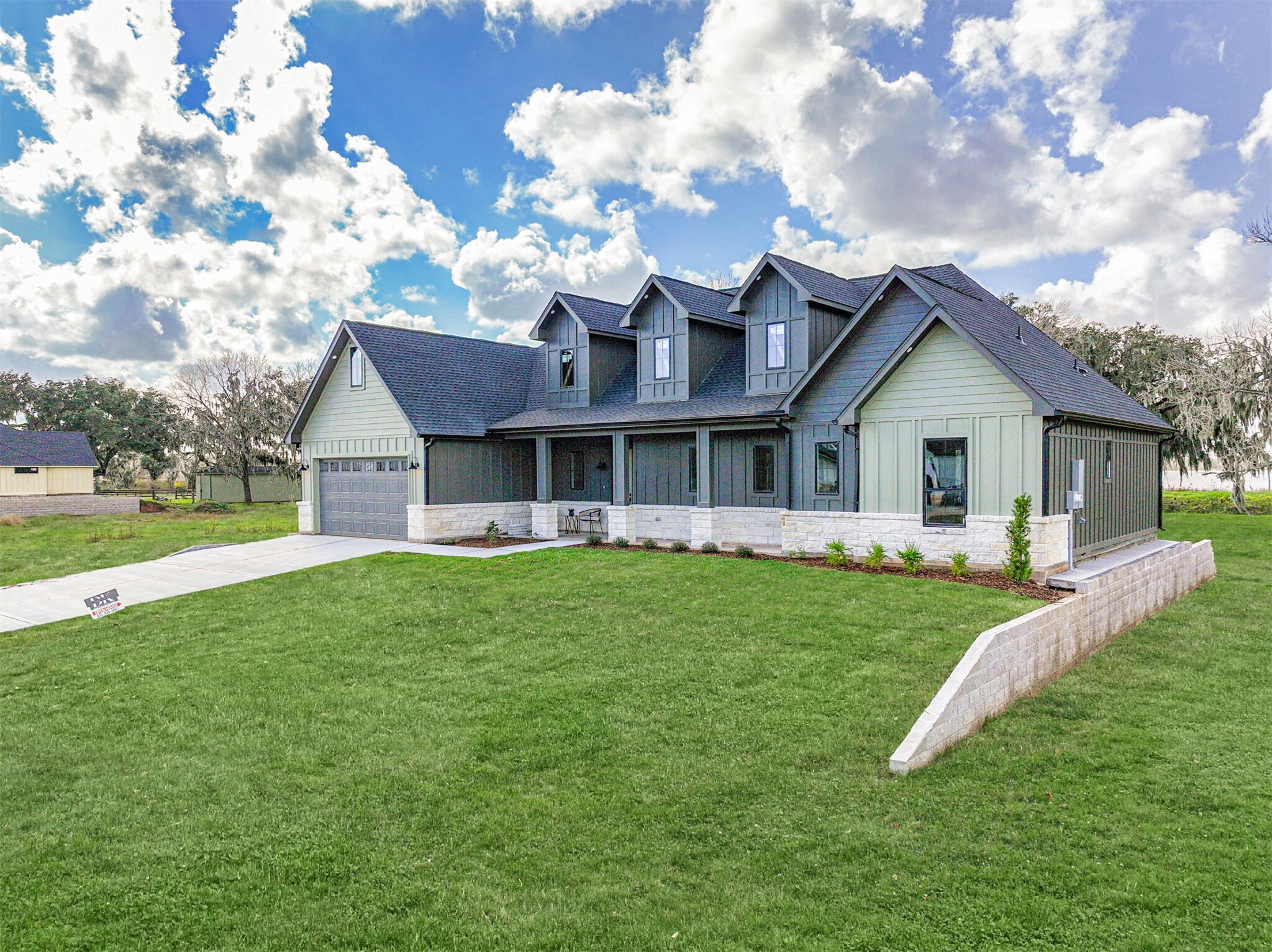 208 Pony Trail Angleton, TX 77515 - Photo 3 of 50 a front view of a house with garden