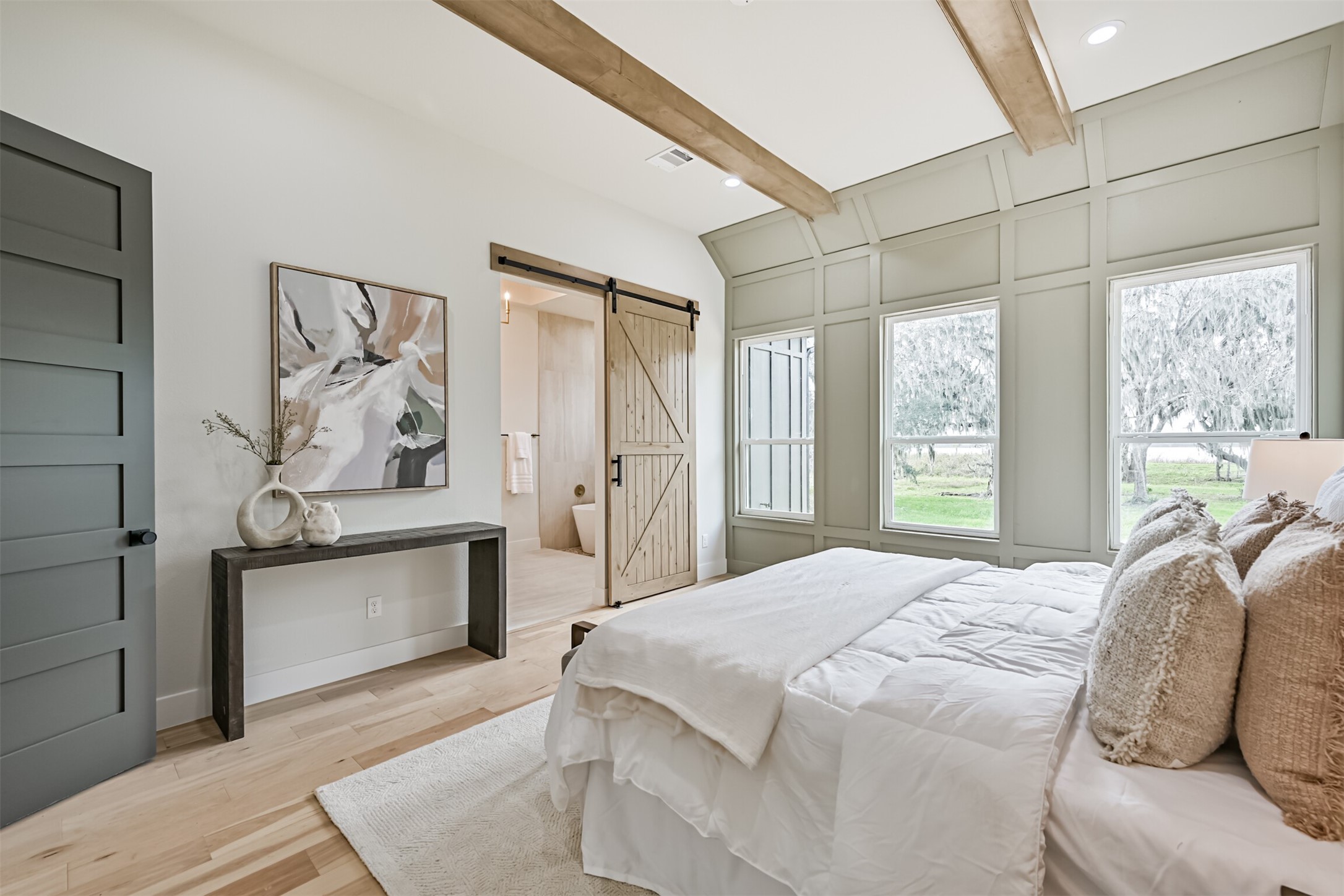 208 Pony Trail Angleton, TX 77515 - Photo 31 of 50 a bedroom with a large bed and a window