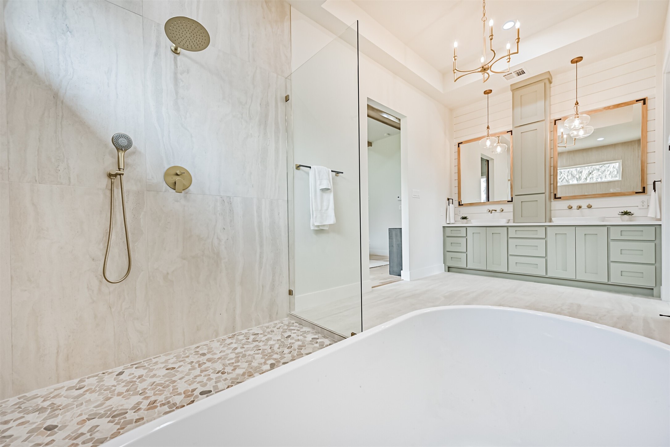 208 Pony Trail Angleton, TX 77515 - Photo 36 of 50 a spacious bathroom with a tub sink shower and mirror