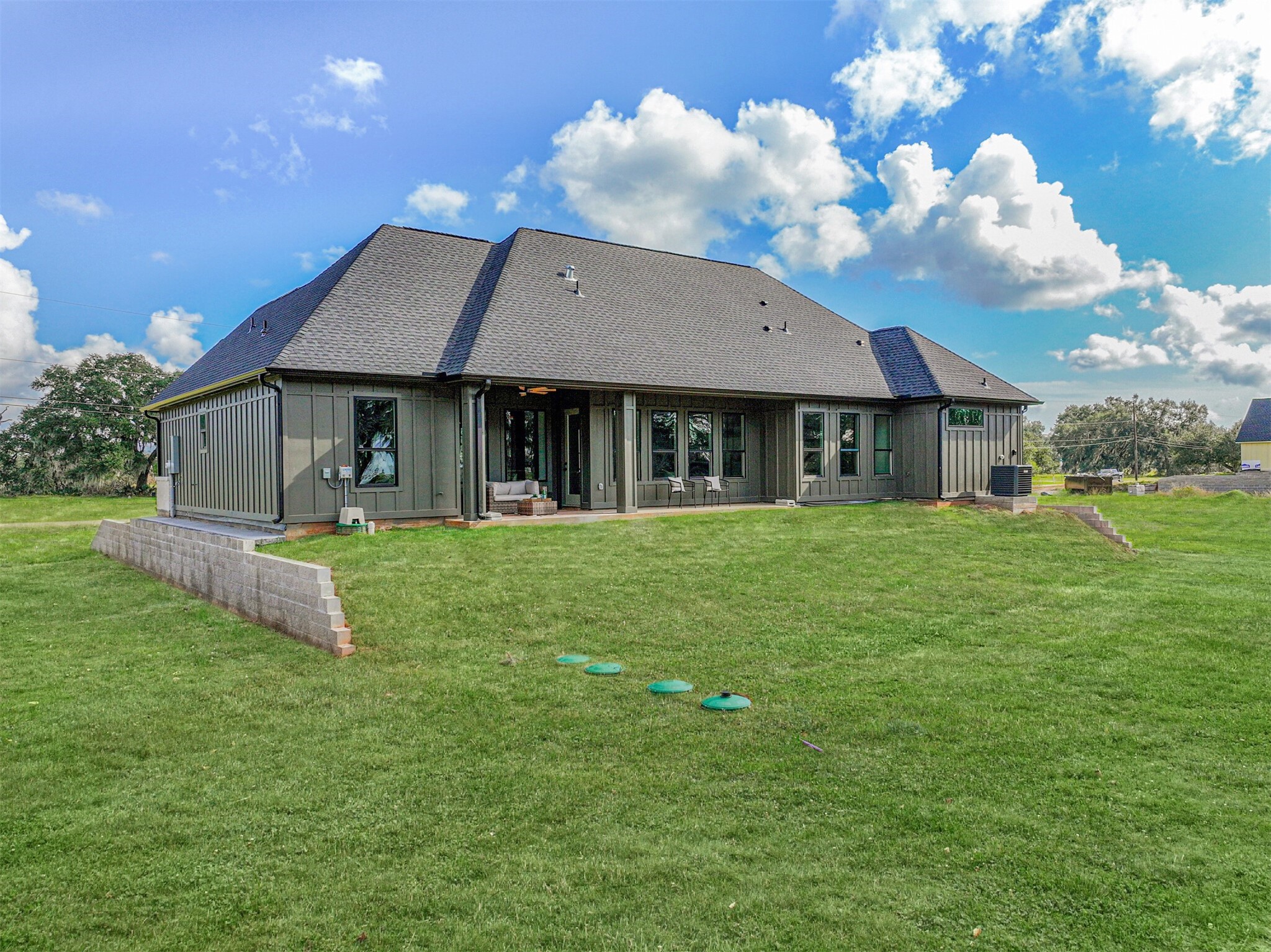 208 Pony Trail Angleton, TX 77515 - Photo 49 of 50 a front view of a house with garden