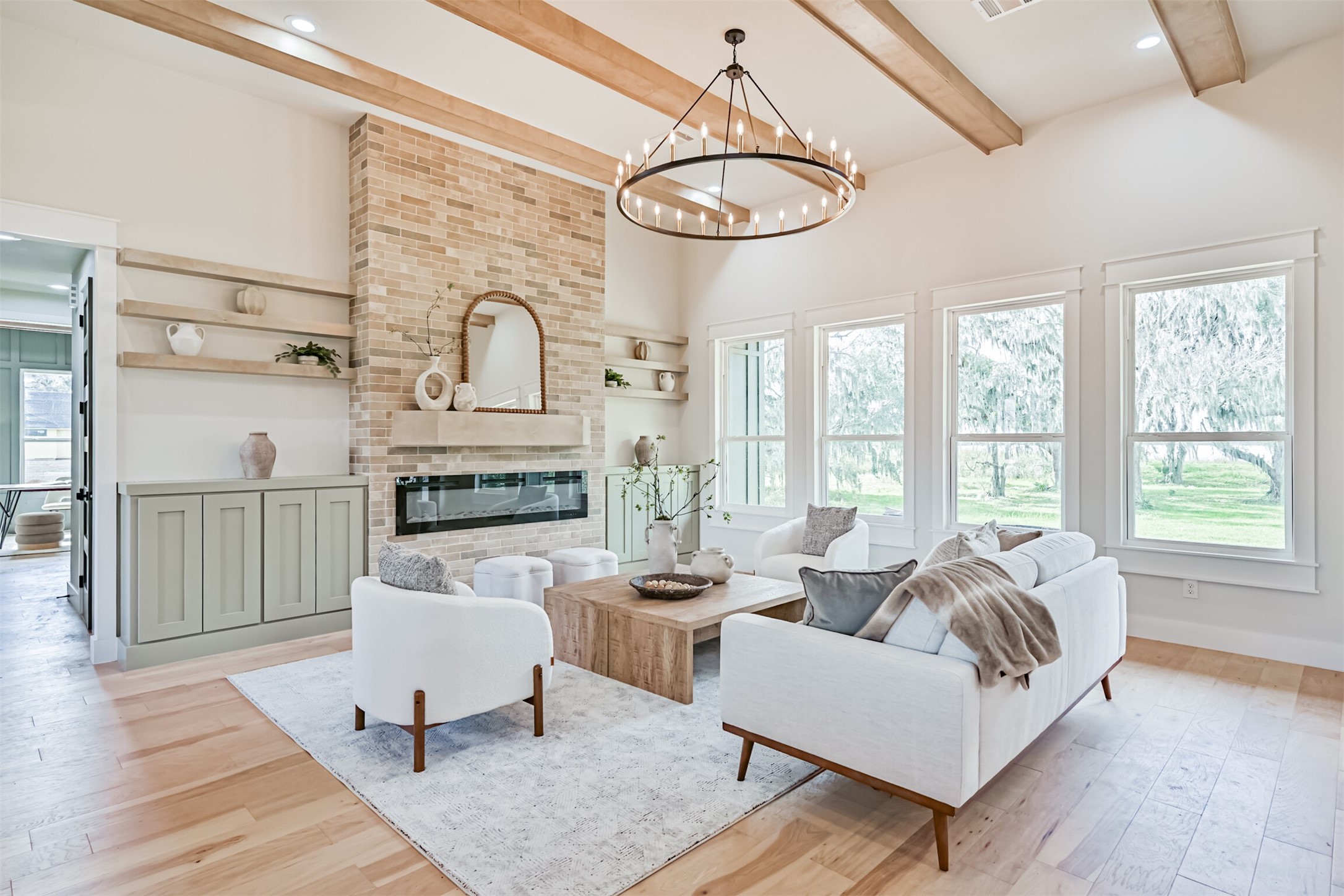 208 Pony Trail Angleton, TX 77515 - Photo 7 of 50 a living room with furniture chandelier and a large window