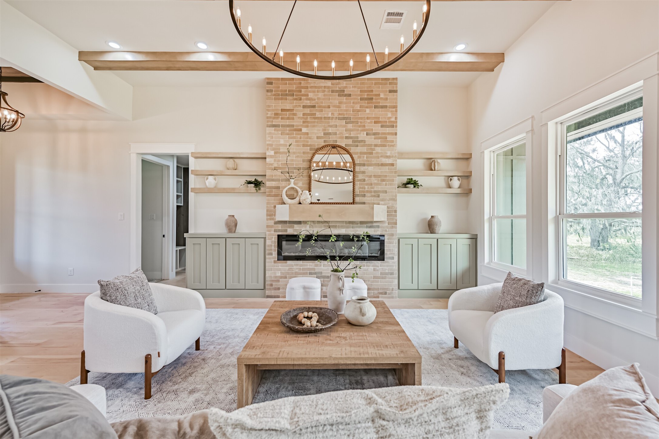 208 Pony Trail Angleton, TX 77515 - Photo 8 of 50 a living room with furniture a rug and a fireplace