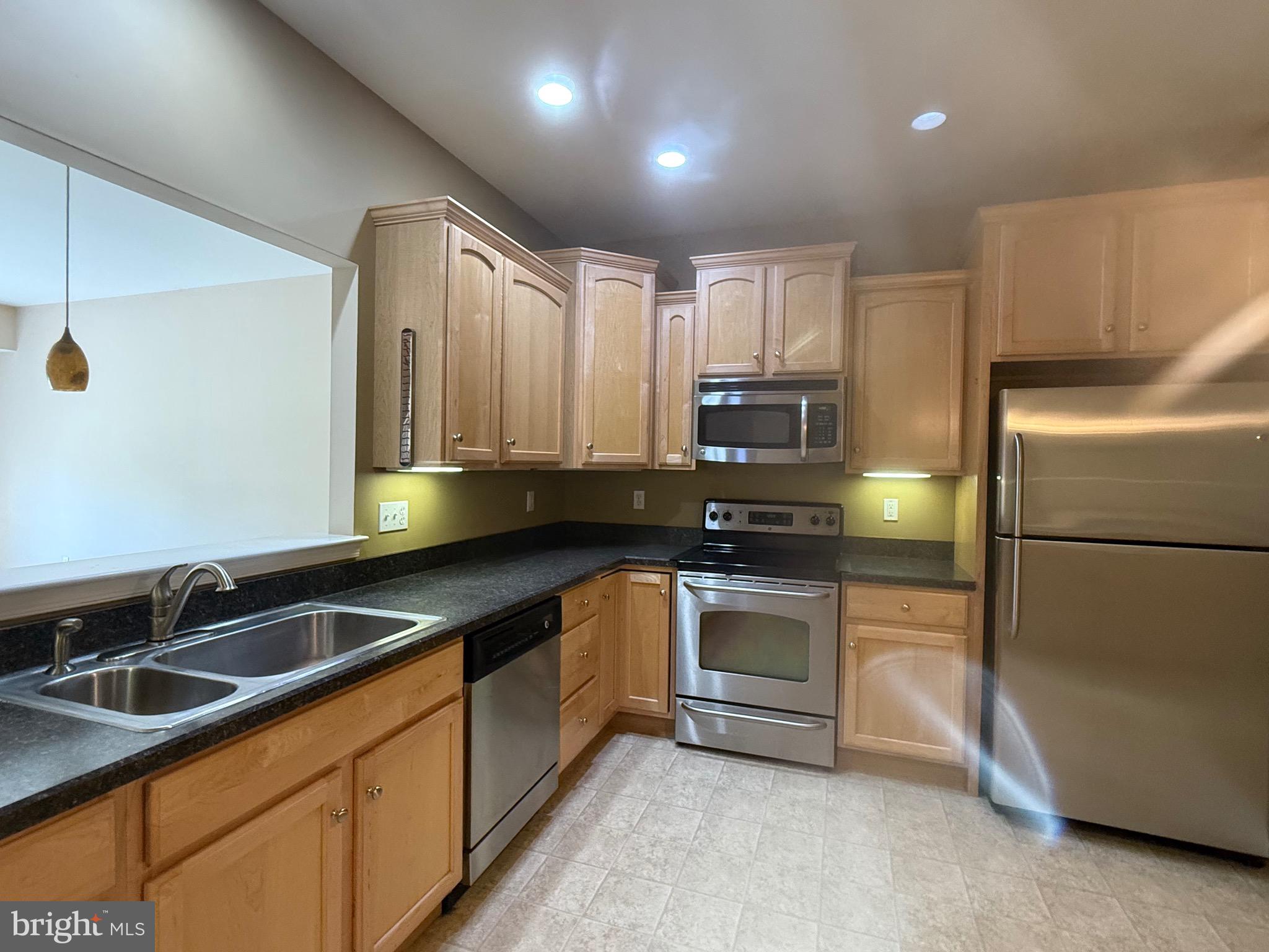 2082 Deer Run Drive Hummelstown, PA 17036 - Photo 4 of 27 a kitchen that has a sink cabinets counter space stainless steel appliances and cabinets