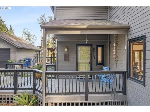 a view of a brick house with a large window