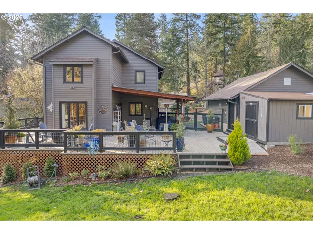 a view of house that has a yard