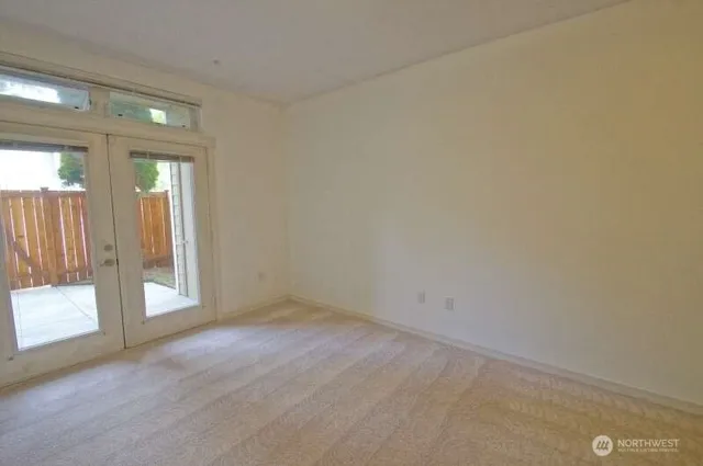 a view of backyard with tub and trees