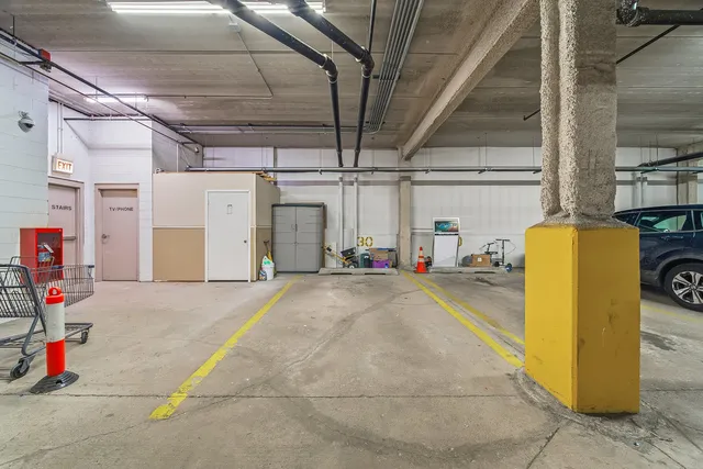 a view of a garage with storage