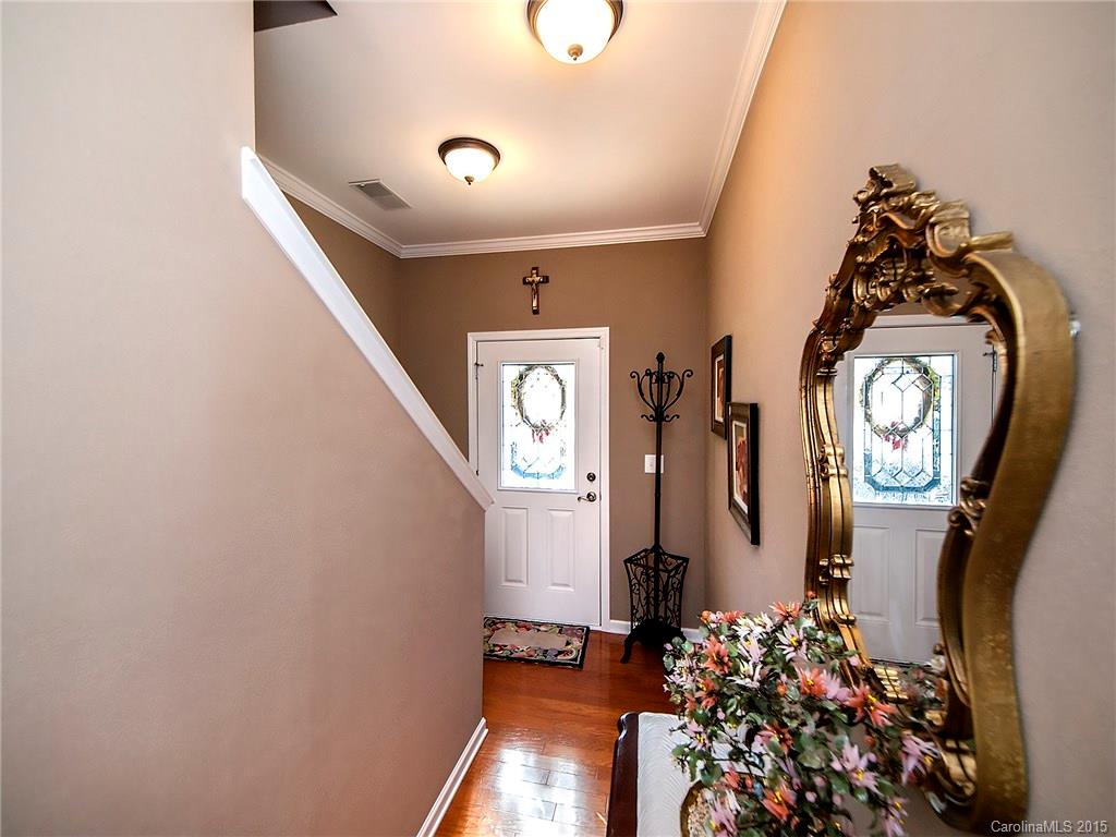 1907 Travertine Lane, Unit 209 Fort Mill, SC 29708 - Photo 2 of 18 a view of entryway with wooden floor