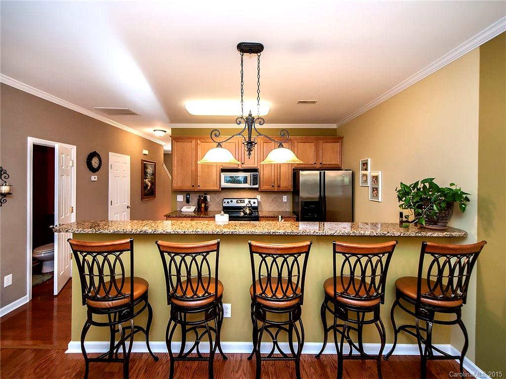 1907 Travertine Lane, Unit 209 Fort Mill, SC 29708 - Photo 6 of 18 a dining room with furniture and window