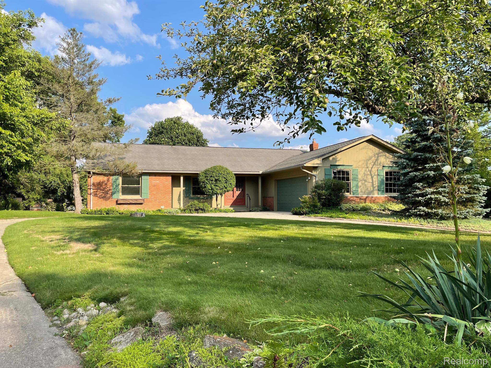5211 Darby Circle Rochester, MI 48306 - Photo 42 of 49 Surrounded by perennial gardens