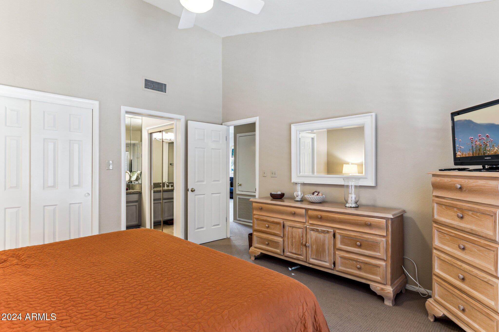9707 East Mountain View Road, Unit 2440 Scottsdale, AZ 85258 - Photo 17 of 29 Master bedroom