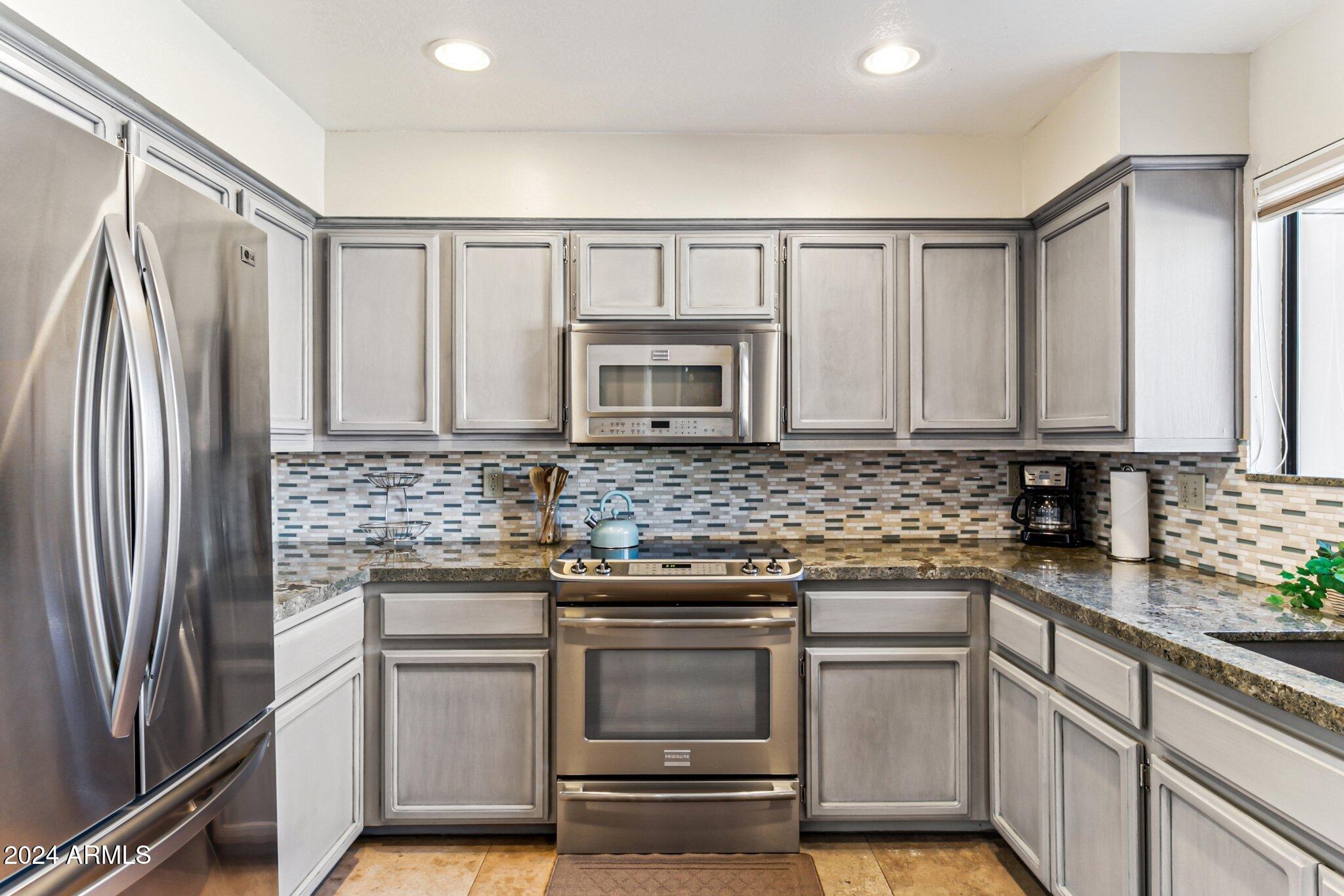 9707 East Mountain View Road, Unit 2440 Scottsdale, AZ 85258 - Photo 5 of 29 Remodeled kitchen