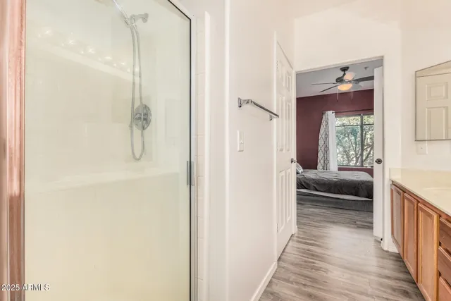 a view of bedroom with furniture and window