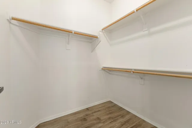 a view of a room with shelf on the wall