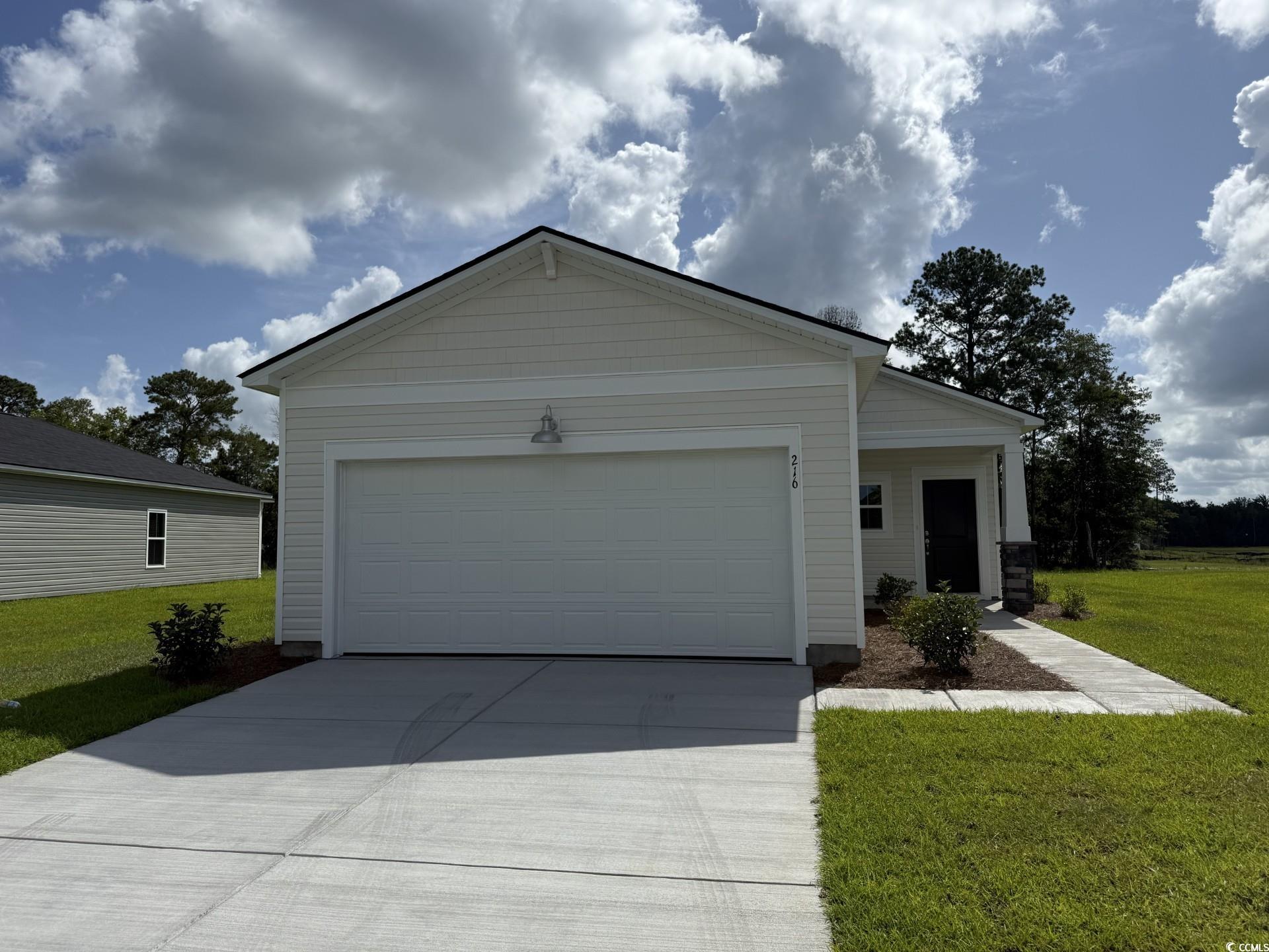 216 Warner Xing Way Loris, SC 29569 - Photo 1 of 12 Single story home featuring driveway, a front yard