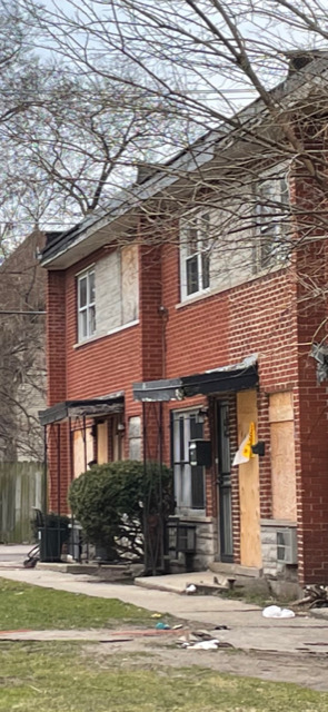 1309 East 75th Street Chicago, IL 60619 - Photo 1 of 1 a front view of building with yard