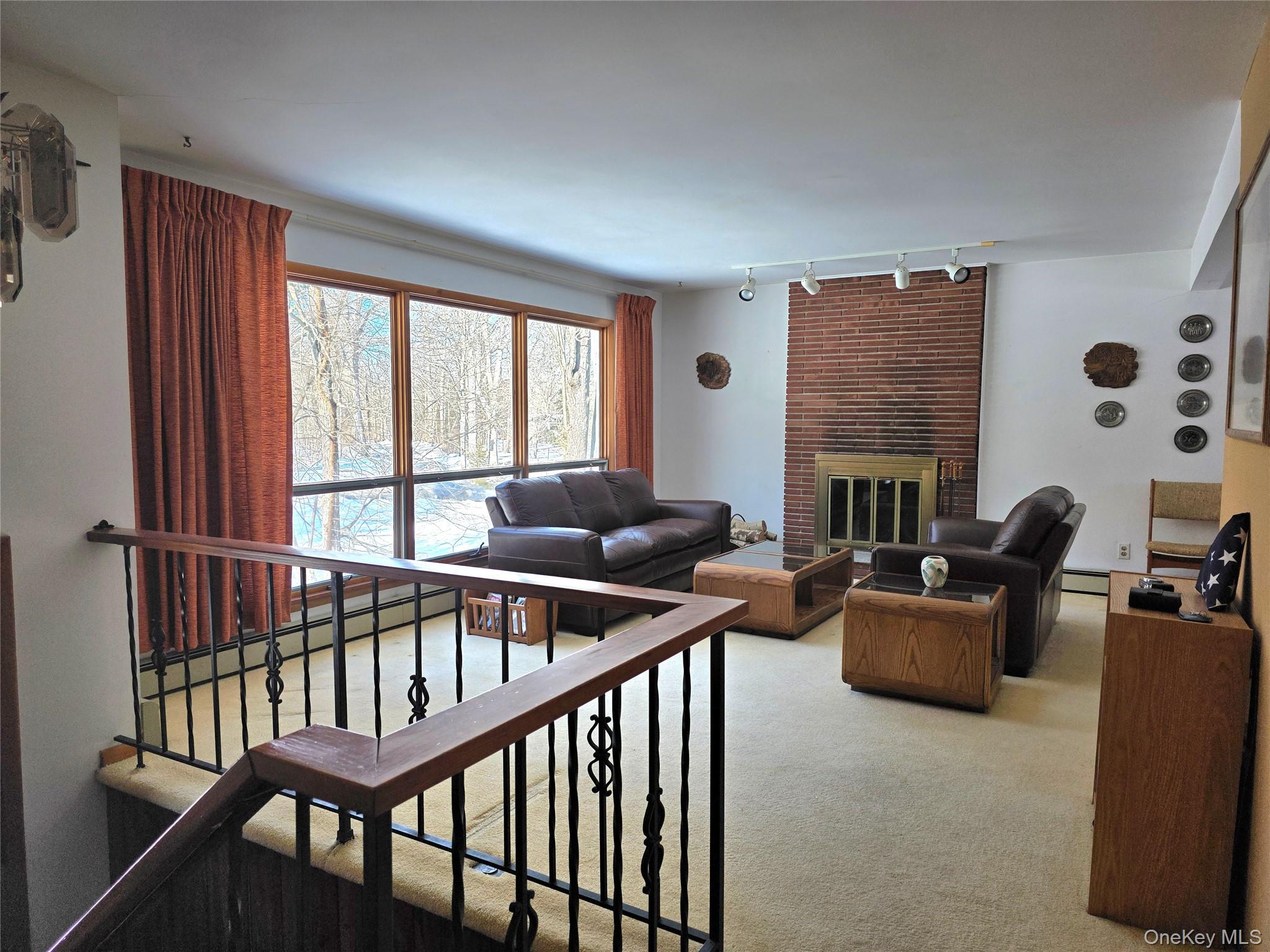 94 Whangtown Road Carmel, NY 10512 - Photo 5 of 12 Living room with wood burning brick fireplace