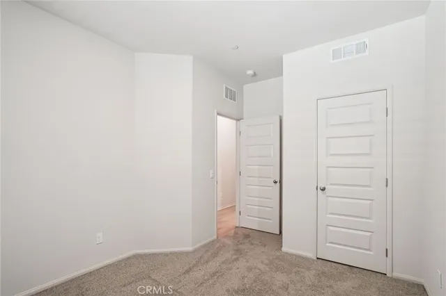 an empty room with closet