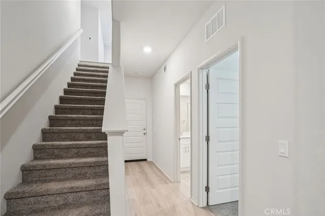 a view of an entryway with stairs