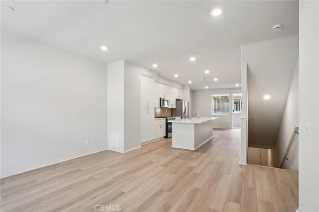 a view of kitchen with wooden floor